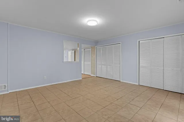 an empty room with windows