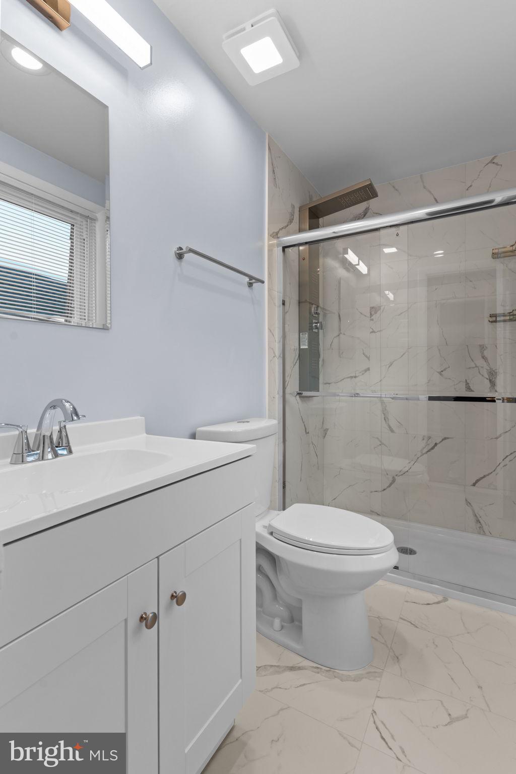 9823 Bonner Street Philadelphia, PA 19115 - Photo 18 of 29 a bathroom with a sink toilet and shower
