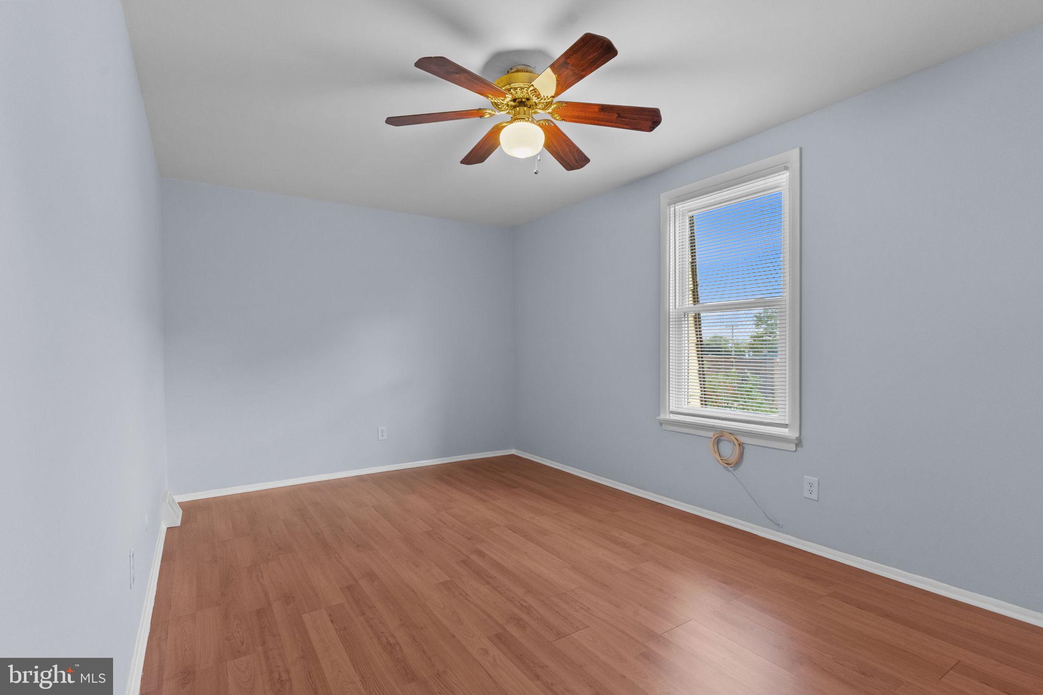 9823 Bonner Street Philadelphia, PA 19115 - Photo 20 of 29 wooden floor in an empty room with a window