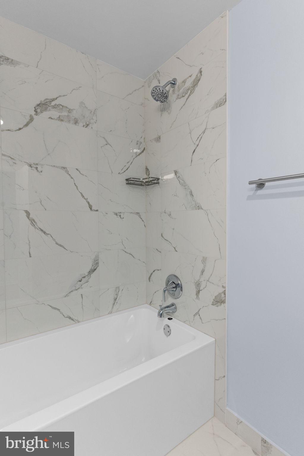 9823 Bonner Street Philadelphia, PA 19115 - Photo 23 of 29 a bathroom with a bathtub