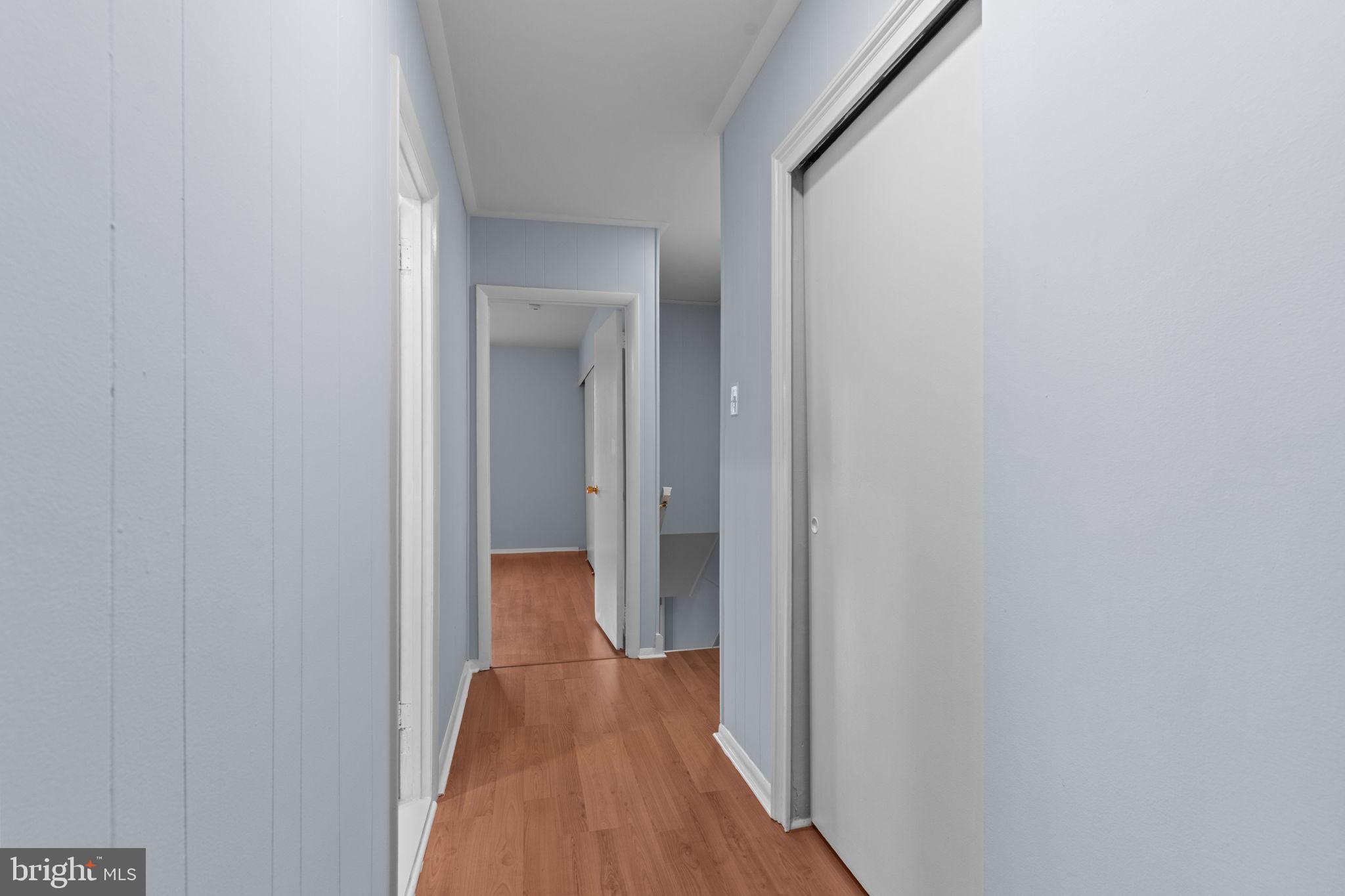 9823 Bonner Street Philadelphia, PA 19115 - Photo 24 of 29 a view of a hallway with wooden floor