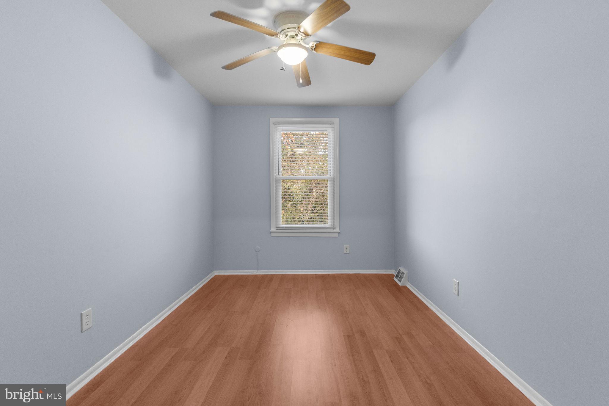 9823 Bonner Street Philadelphia, PA 19115 - Photo 25 of 29 a view of empty room with wooden floor and fan