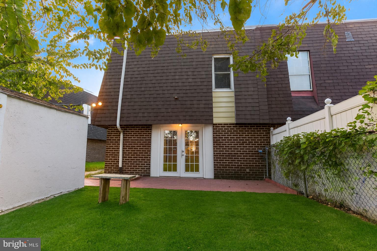 9823 Bonner Street Philadelphia, PA 19115 - Photo 29 of 29 a front view of a house with a garden