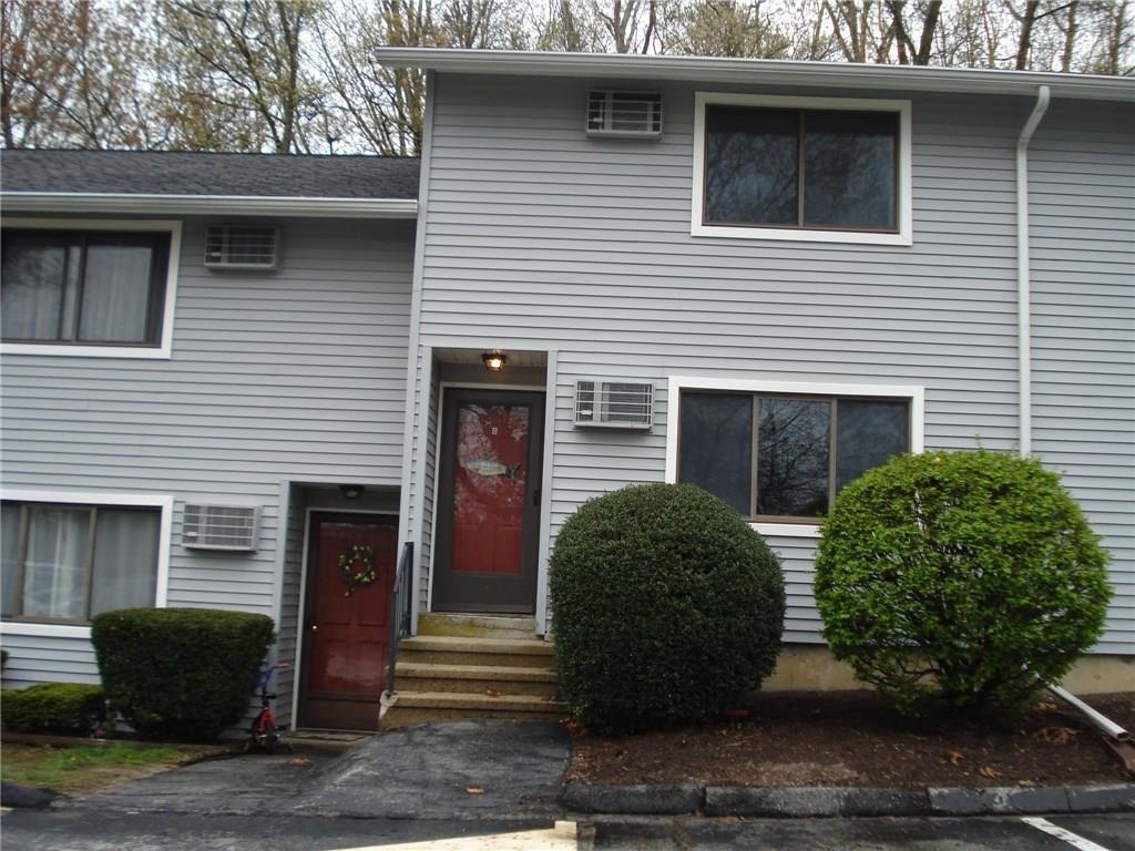 292 Meridian Street, Unit G Groton, CT 06340 - Photo 1 of 1 a view of a house with a yard and large windows