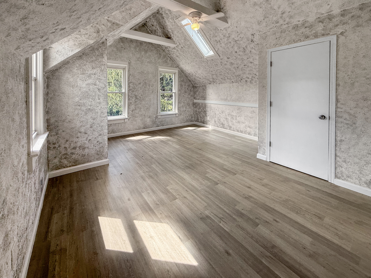 302 West Cook Street Sheffield, IL 61361 - Photo 15 of 18 an empty room with wooden floor and windows