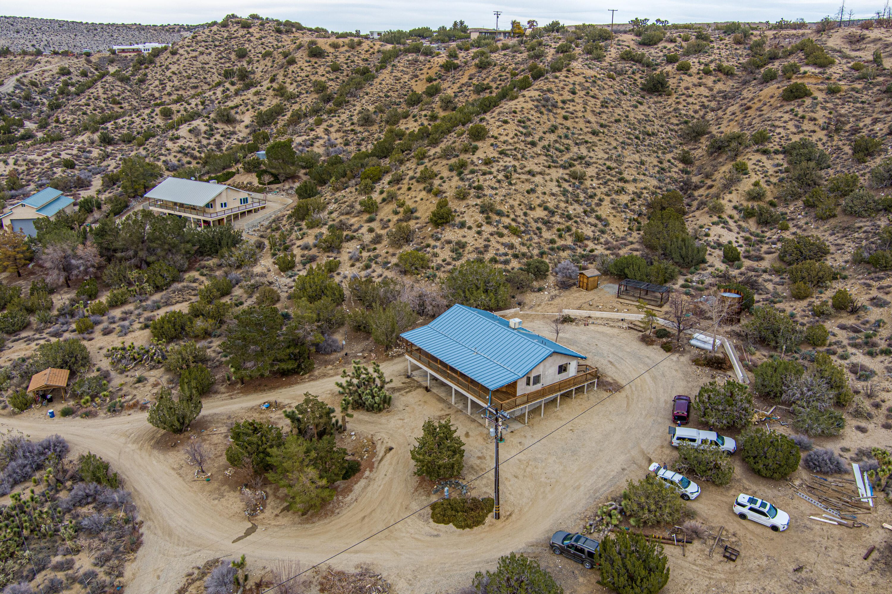 17118 Bob's Gap Road Valyermo, CA 93563 - Photo 44 of 55 an aerial view of houses with yard