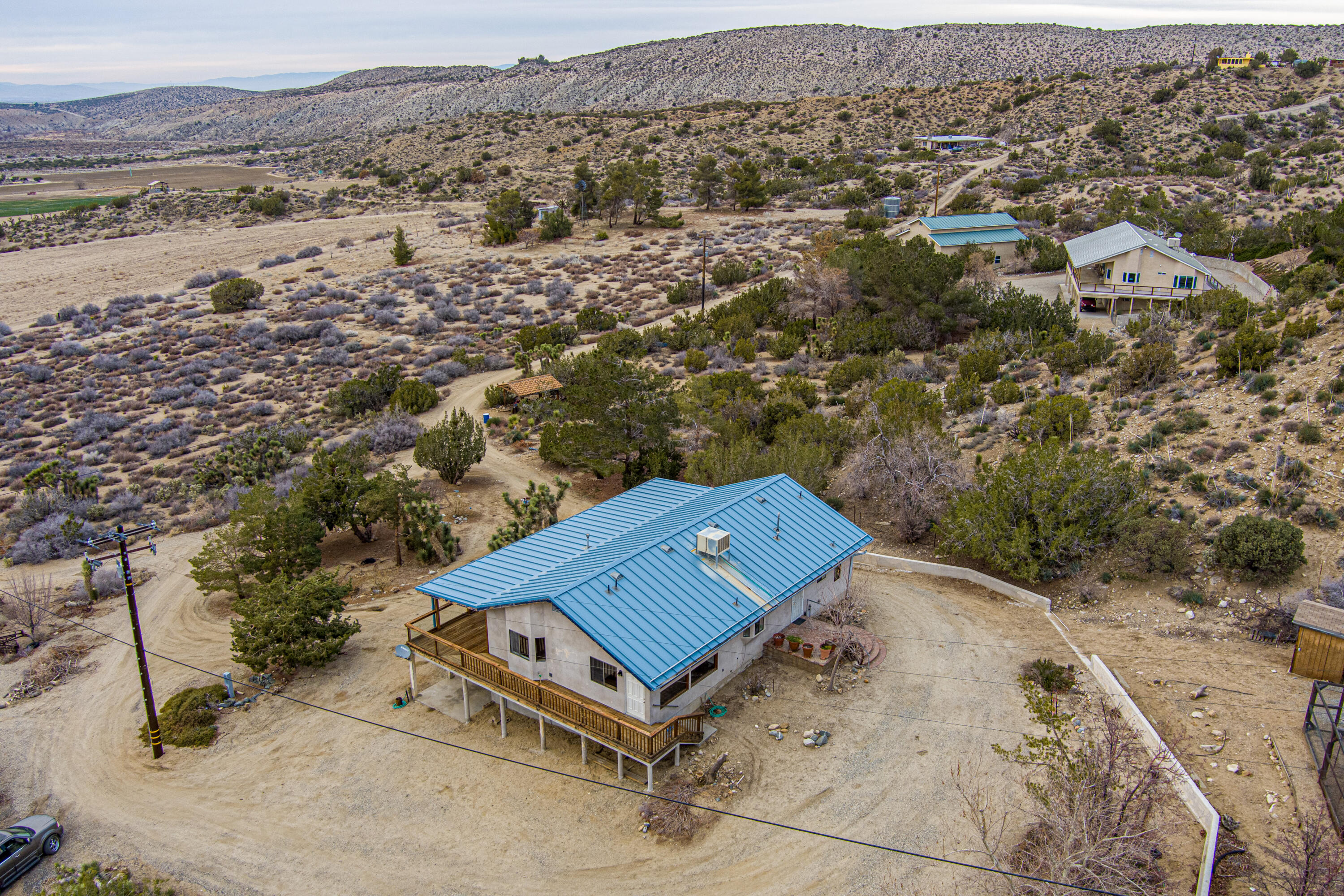 17118 Bob's Gap Road Valyermo, CA 93563 - Photo 50 of 55 an aerial view of a backyard with mountain view