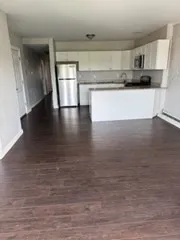 a kitchen with a sink and a stove top oven