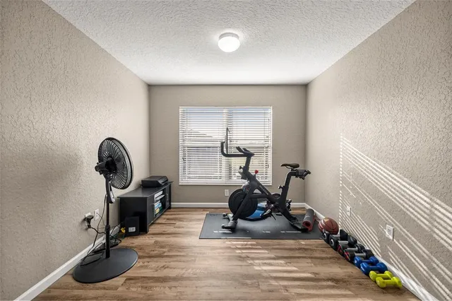 a view of a room with gym equipment