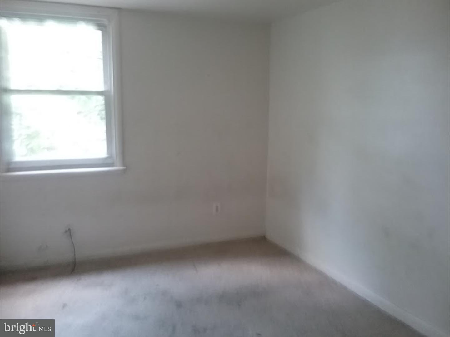 1243 Elson Road Brookhaven, PA 19015 - Photo 4 of 6 an empty room with a window