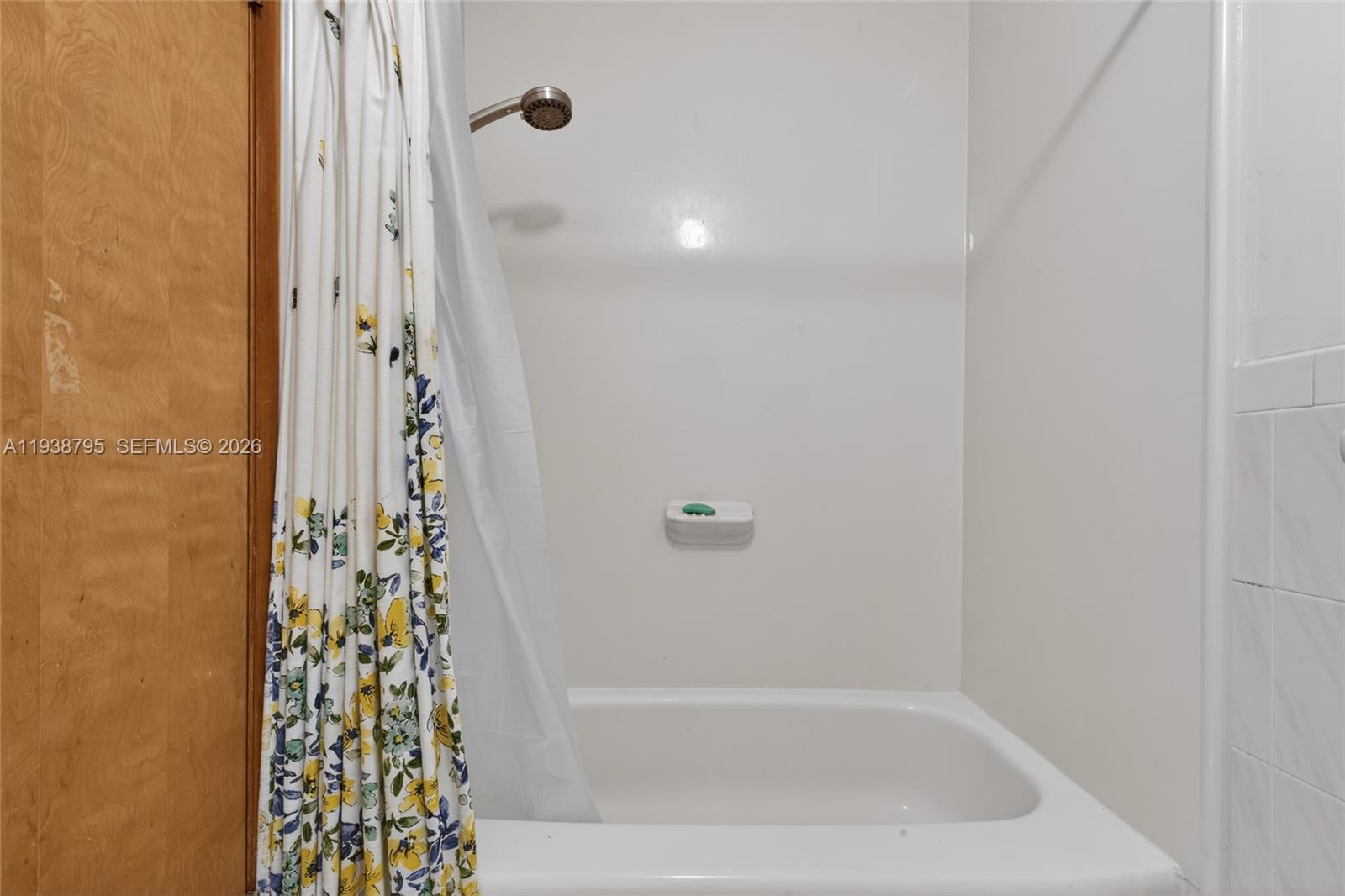 1136 Southwest 139th Place Miami, FL 33184 - Photo 32 of 42 a bathroom with a bathtub and shower