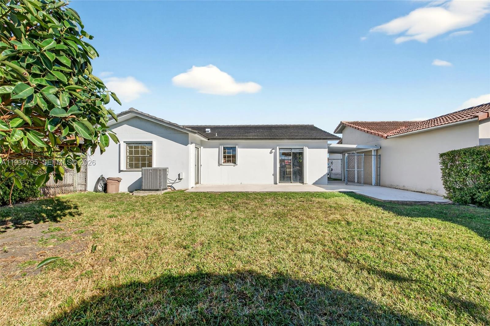 1136 Southwest 139th Place Miami, FL 33184 - Photo 36 of 42 a view of a house with backyard