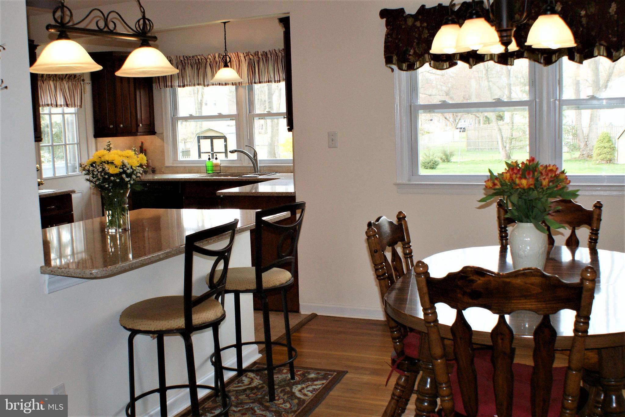 27 Sheffield Road East Windsor, NJ 08520 - Photo 4 of 33 Dining room and kitchen