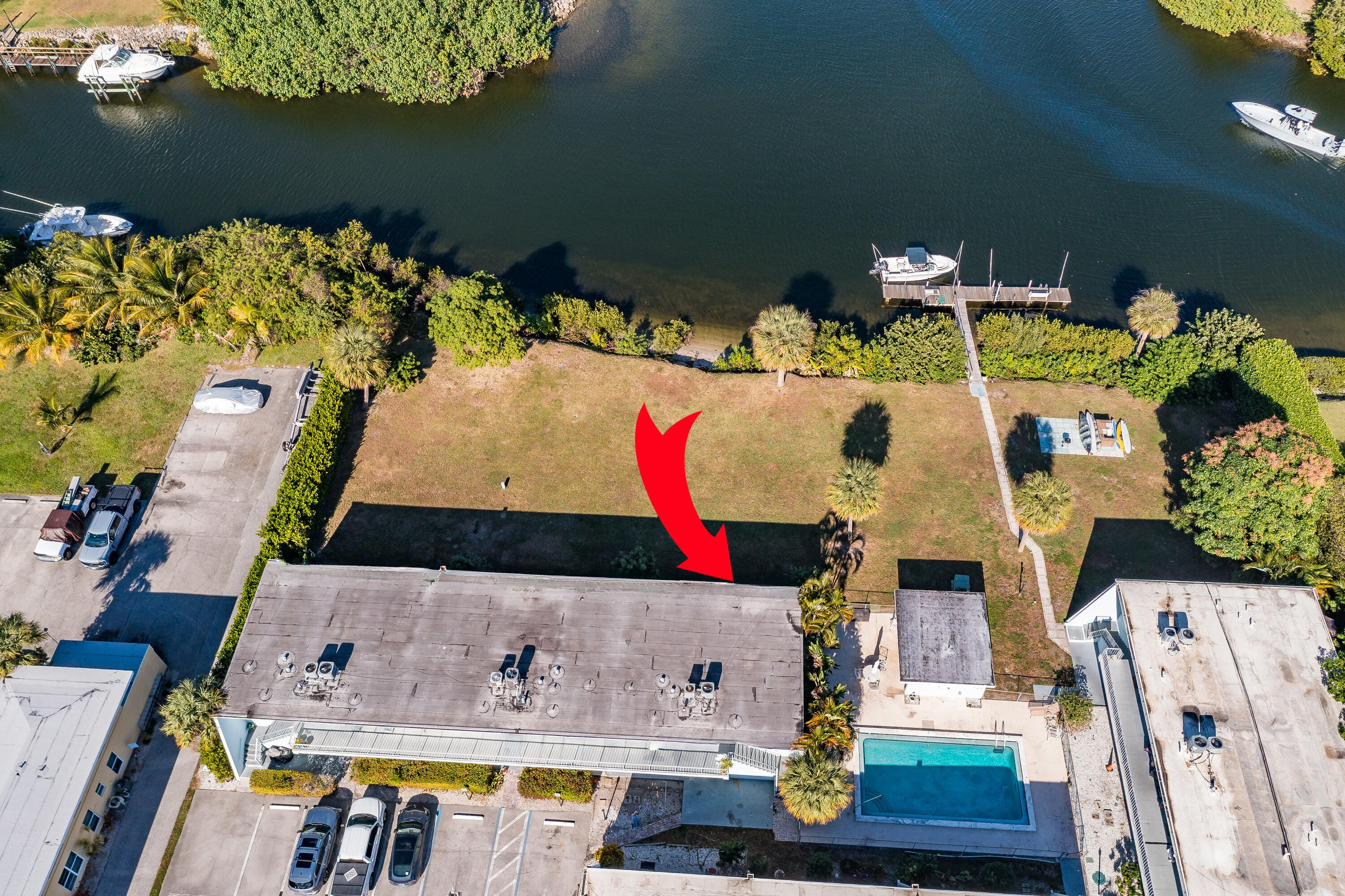 725 Hummingbird Way, Unit 103 North Palm Beach, FL 33408 - Photo 11 of 52 an aerial view of residential house with outdoor space and swimming pool