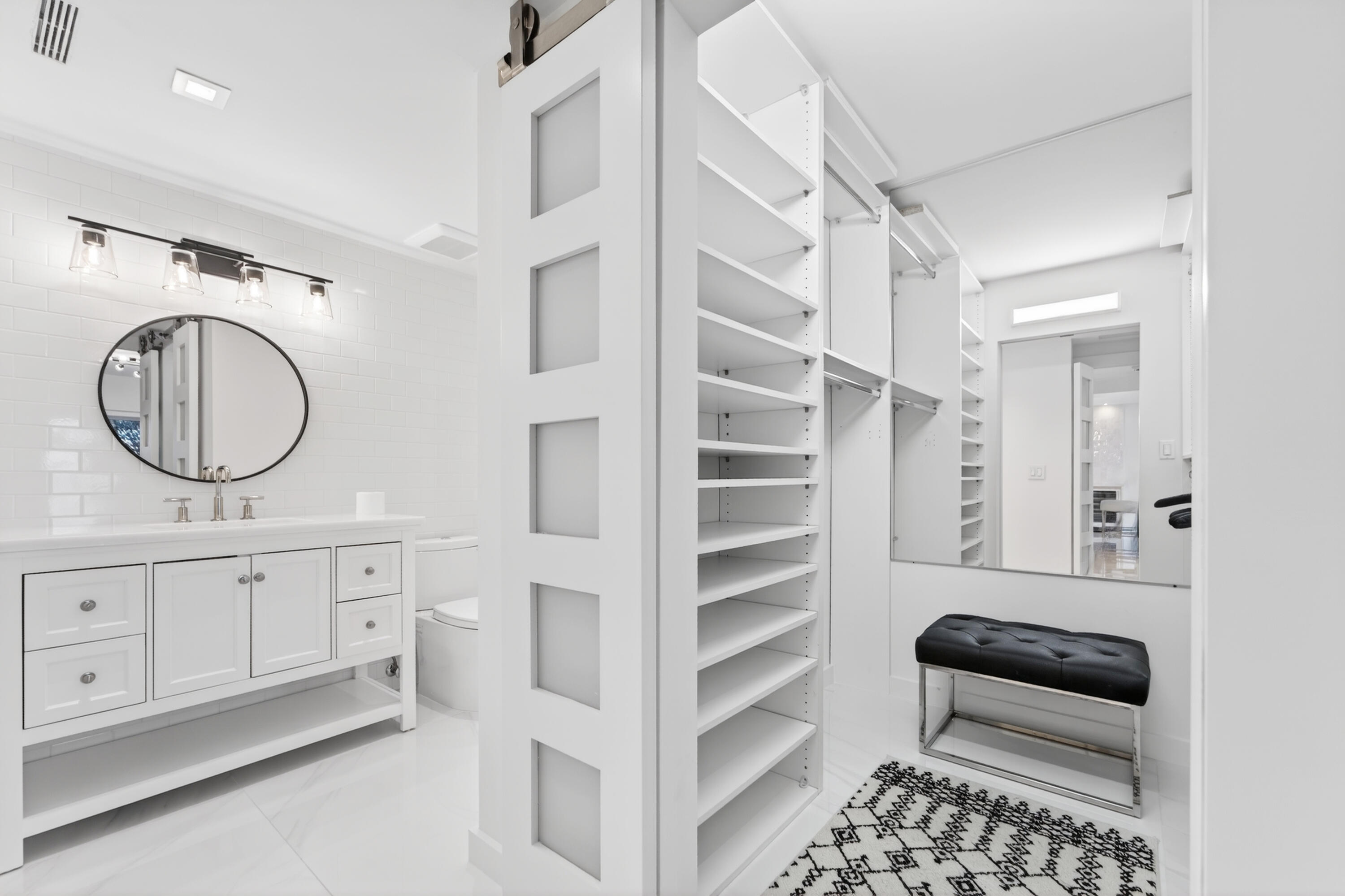 725 Hummingbird Way, Unit 103 North Palm Beach, FL 33408 - Photo 15 of 52 a view of a bathroom with dual sinks