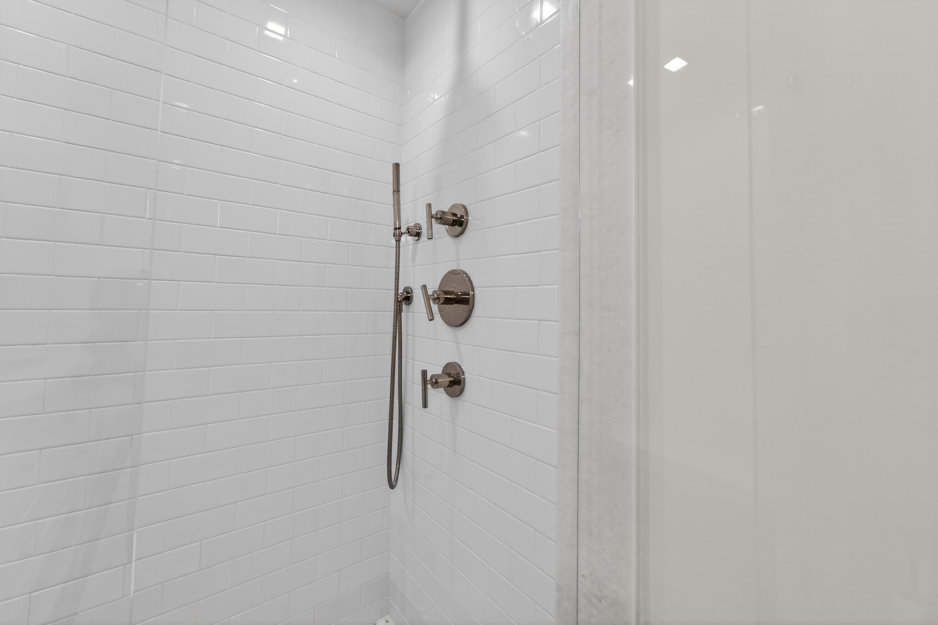 725 Hummingbird Way, Unit 103 North Palm Beach, FL 33408 - Photo 19 of 52 a bathroom with a shower