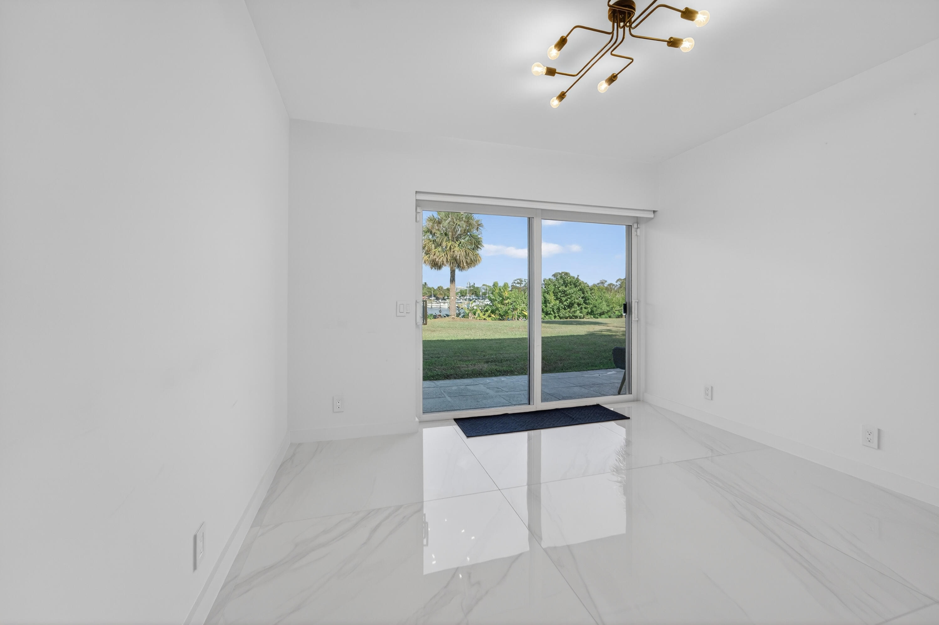 725 Hummingbird Way, Unit 103 North Palm Beach, FL 33408 - Photo 21 of 52 a view of room with window