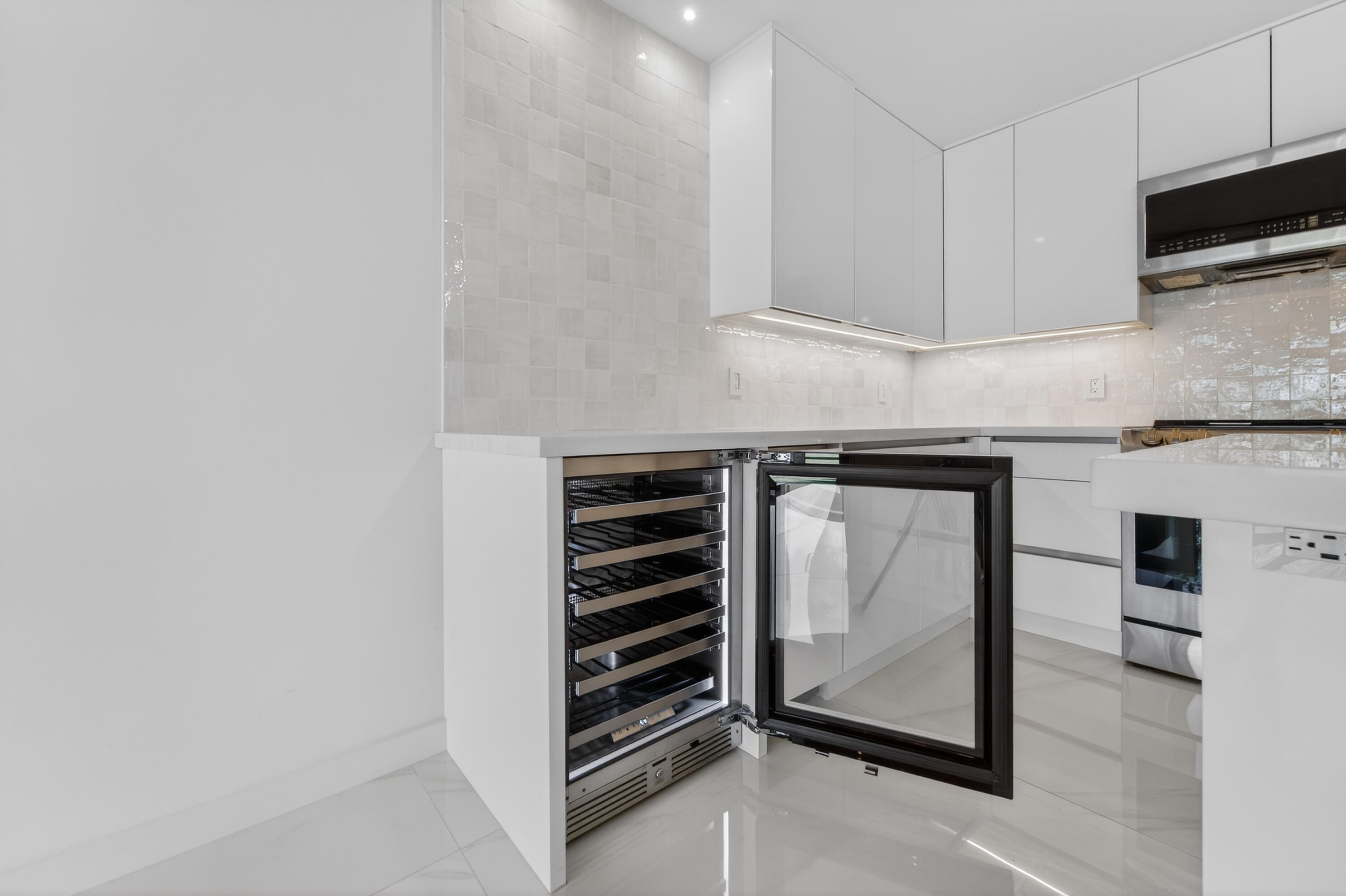 725 Hummingbird Way, Unit 103 North Palm Beach, FL 33408 - Photo 28 of 52 a view of a storage & utility room