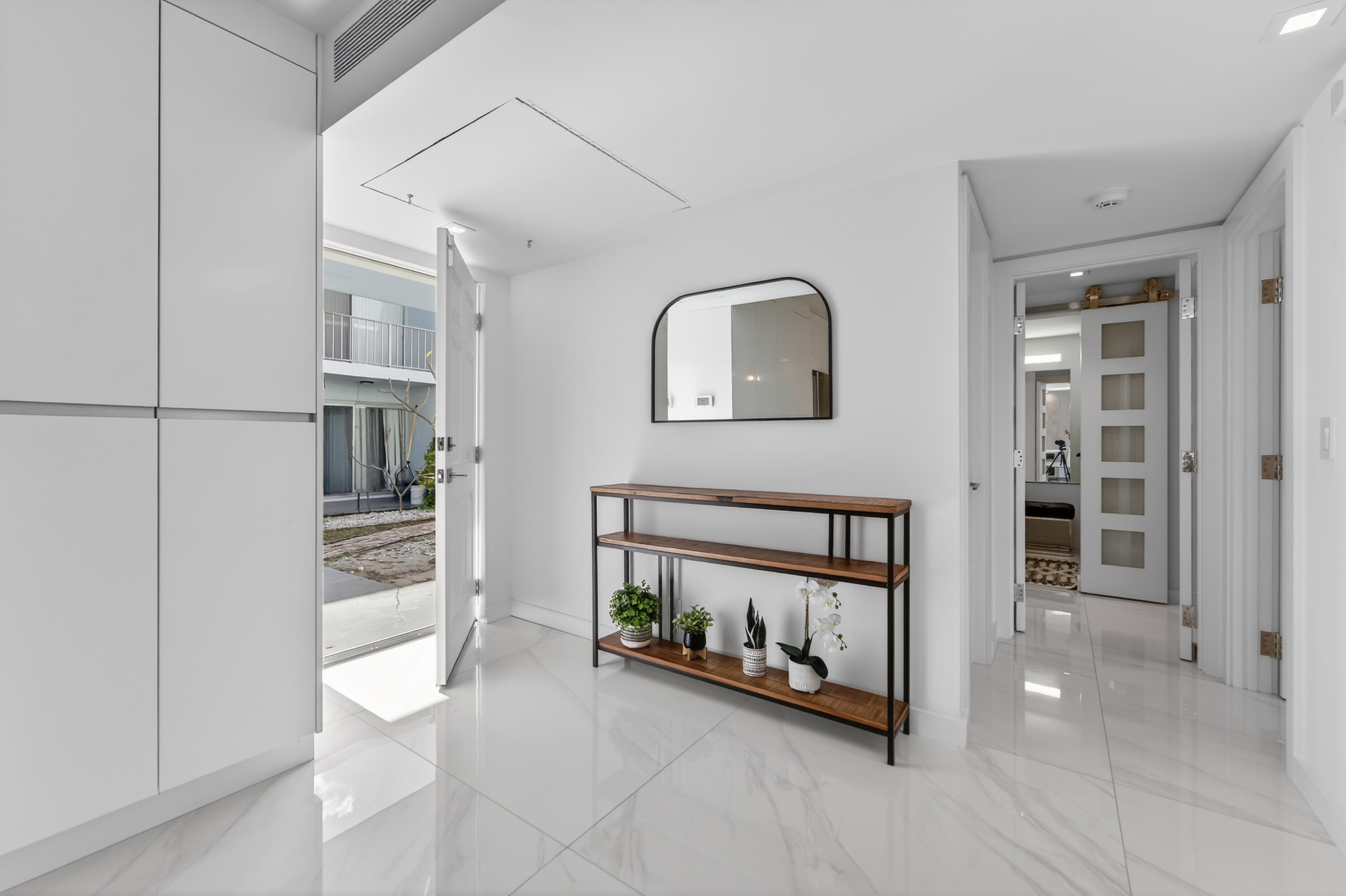 725 Hummingbird Way, Unit 103 North Palm Beach, FL 33408 - Photo 32 of 52 a view of livingroom with furniture and fireplace