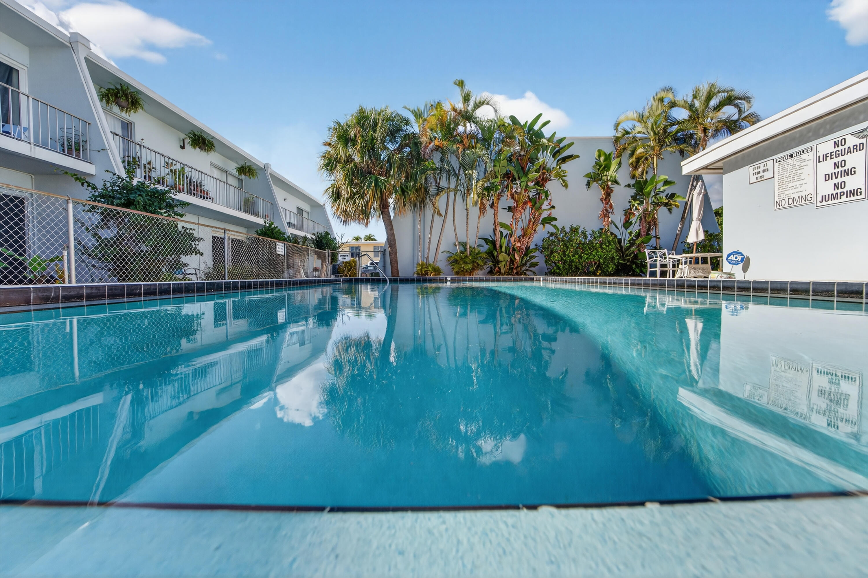 725 Hummingbird Way, Unit 103 North Palm Beach, FL 33408 - Photo 47 of 52 a view of a lake