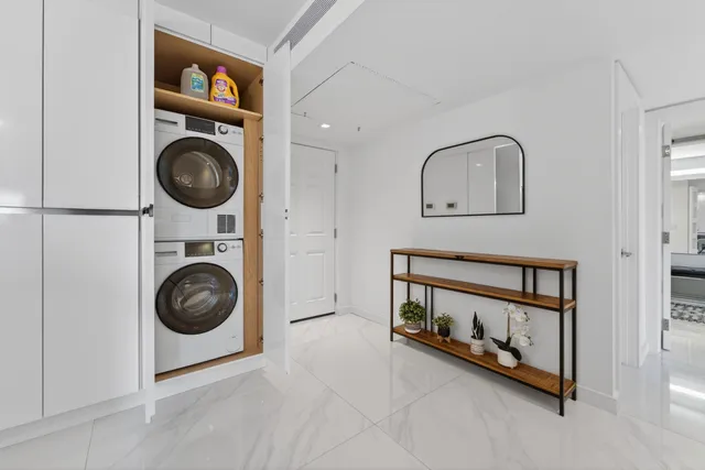 a view of livingroom with washer and dryer