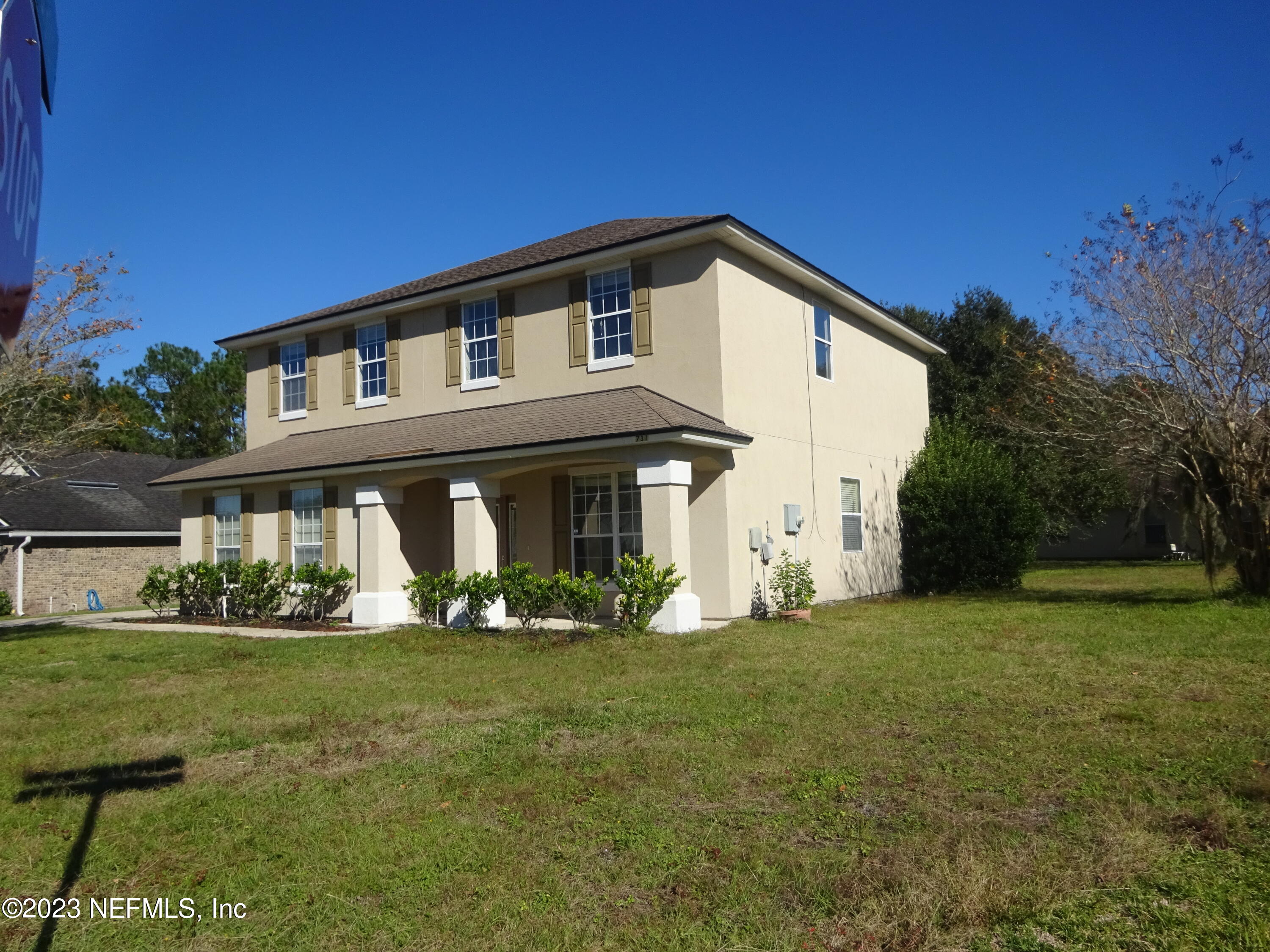 731 East Red House Branch Road St. Augustine, FL 32084 - Photo 2 of 54 a front view of house with yard