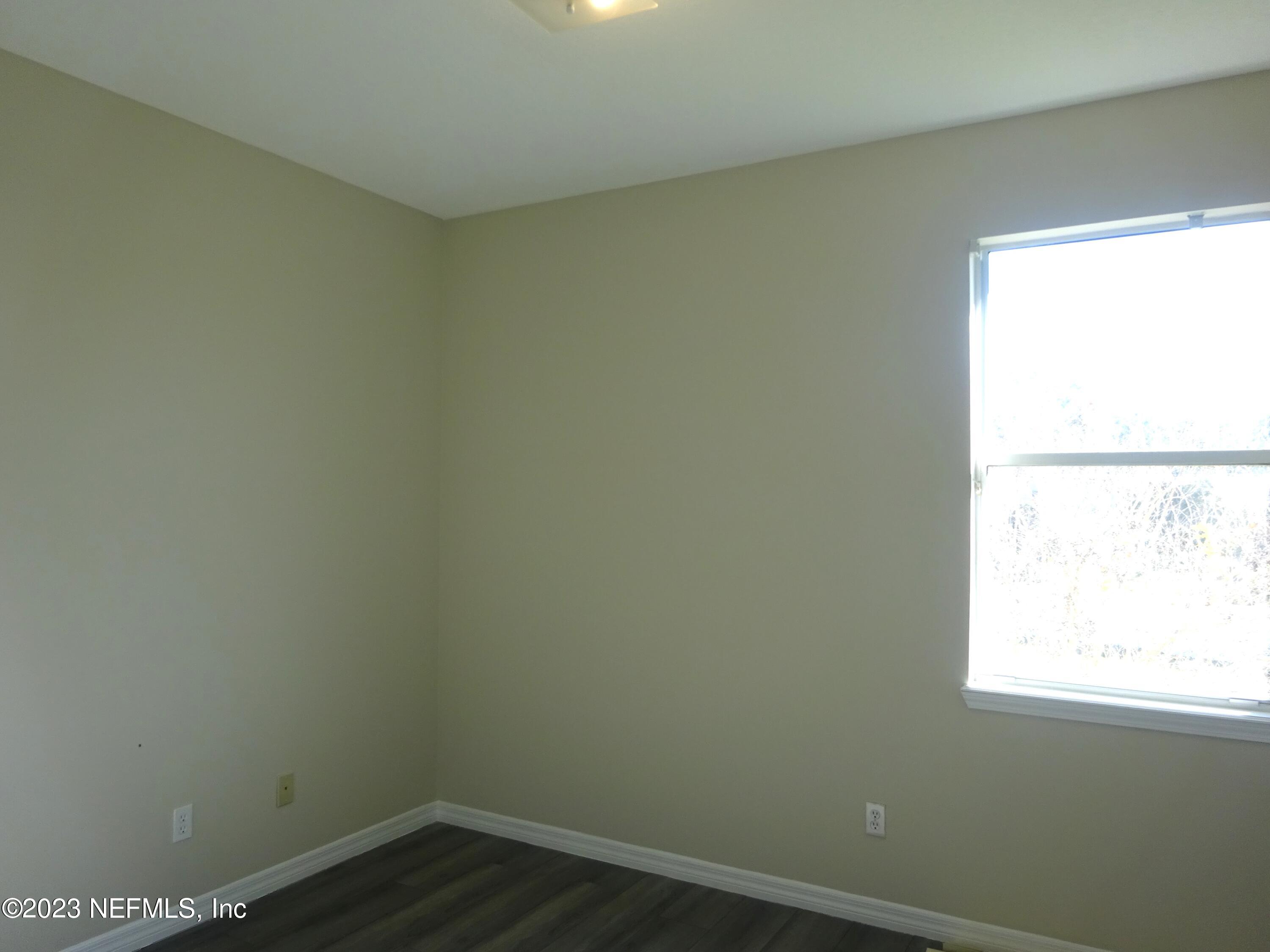 731 East Red House Branch Road St. Augustine, FL 32084 - Photo 30 of 54 an empty room with a window