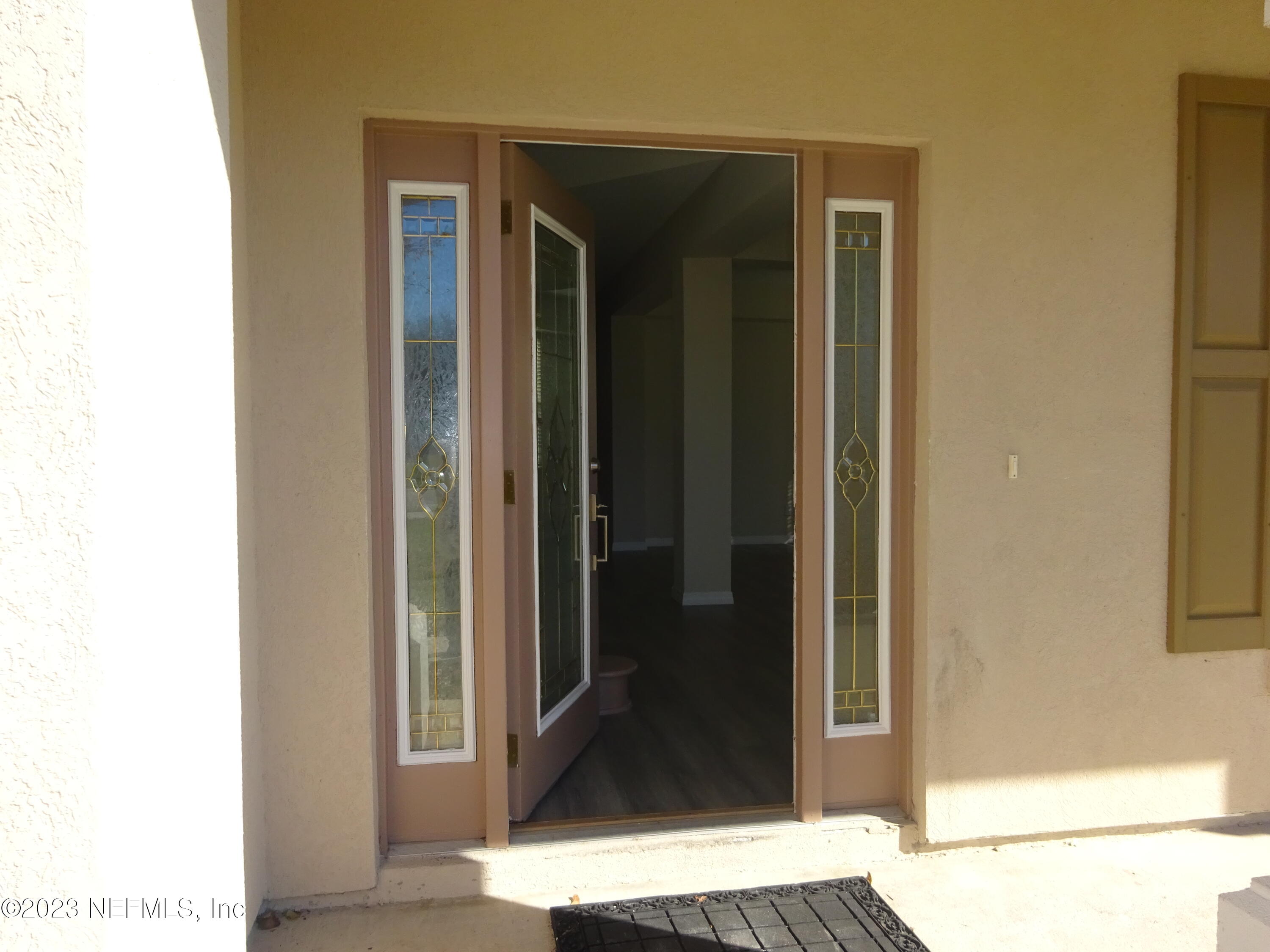731 East Red House Branch Road St. Augustine, FL 32084 - Photo 4 of 54 a view of a wooden door