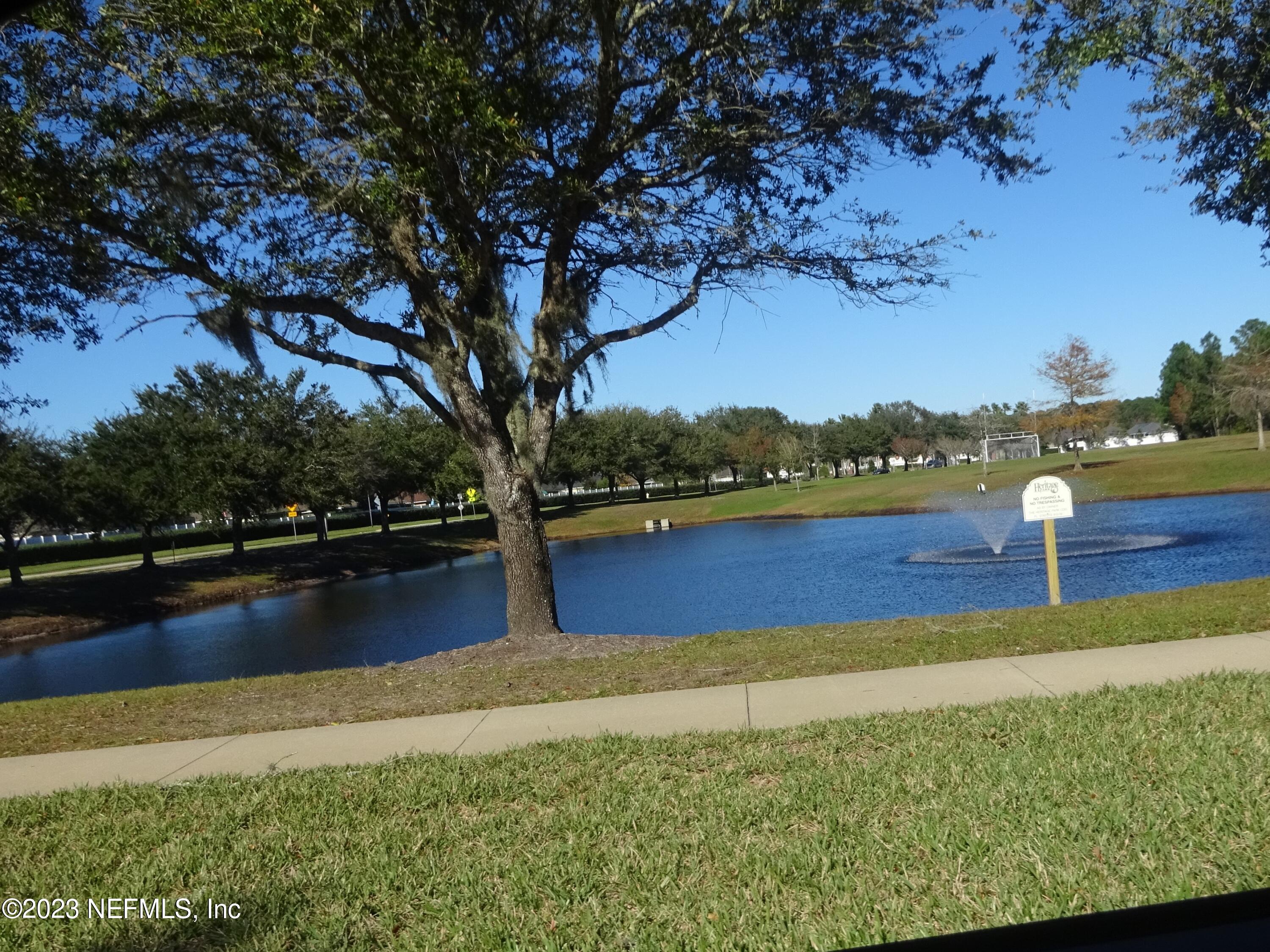 731 East Red House Branch Road St. Augustine, FL 32084 - Photo 43 of 54 a view of a lake with houses