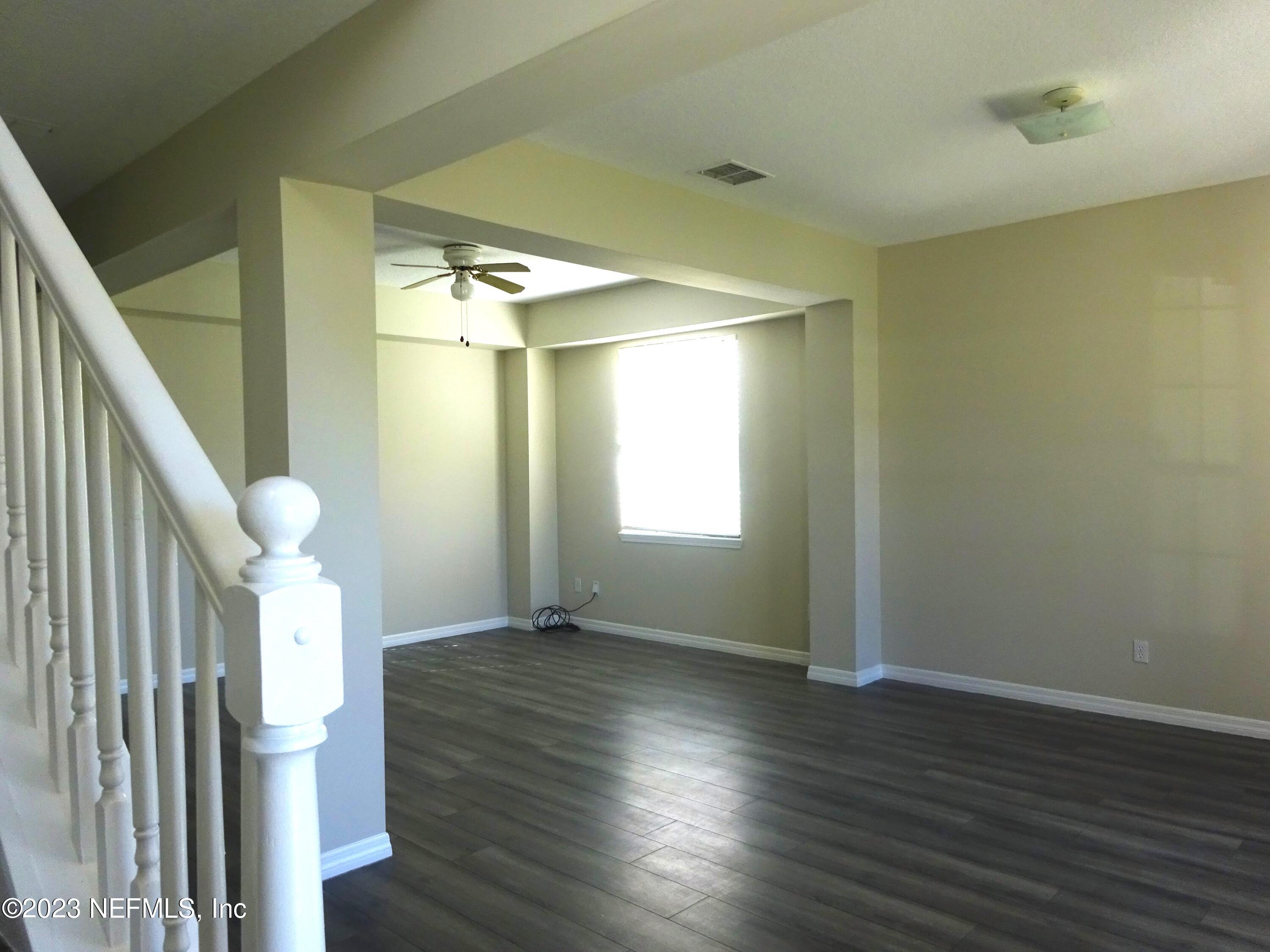 731 East Red House Branch Road St. Augustine, FL 32084 - Photo 7 of 54 a view of entryway with wooden floor