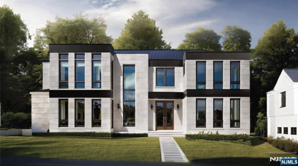 144 Demarest Avenue Englewood Cliffs, NJ 07632 - Photo 1 of 1 front view of a house with a yard