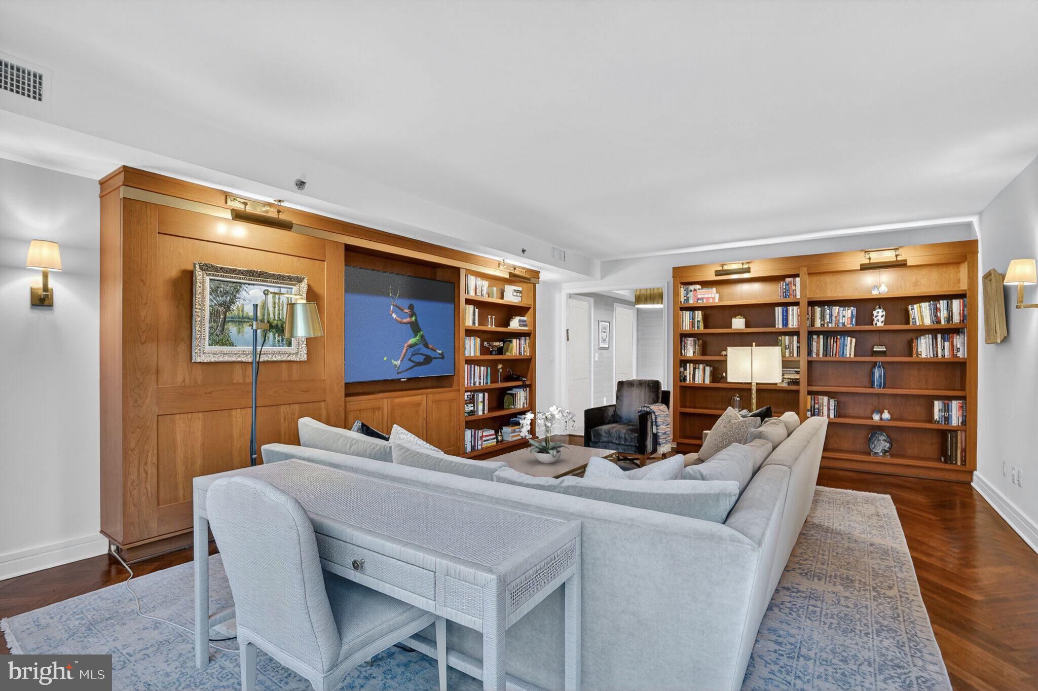 1111 23rd Street Northwest, Unit 2B Washington, DC 20037 - Photo 4 of 22 a dining room with furniture and wooden floor