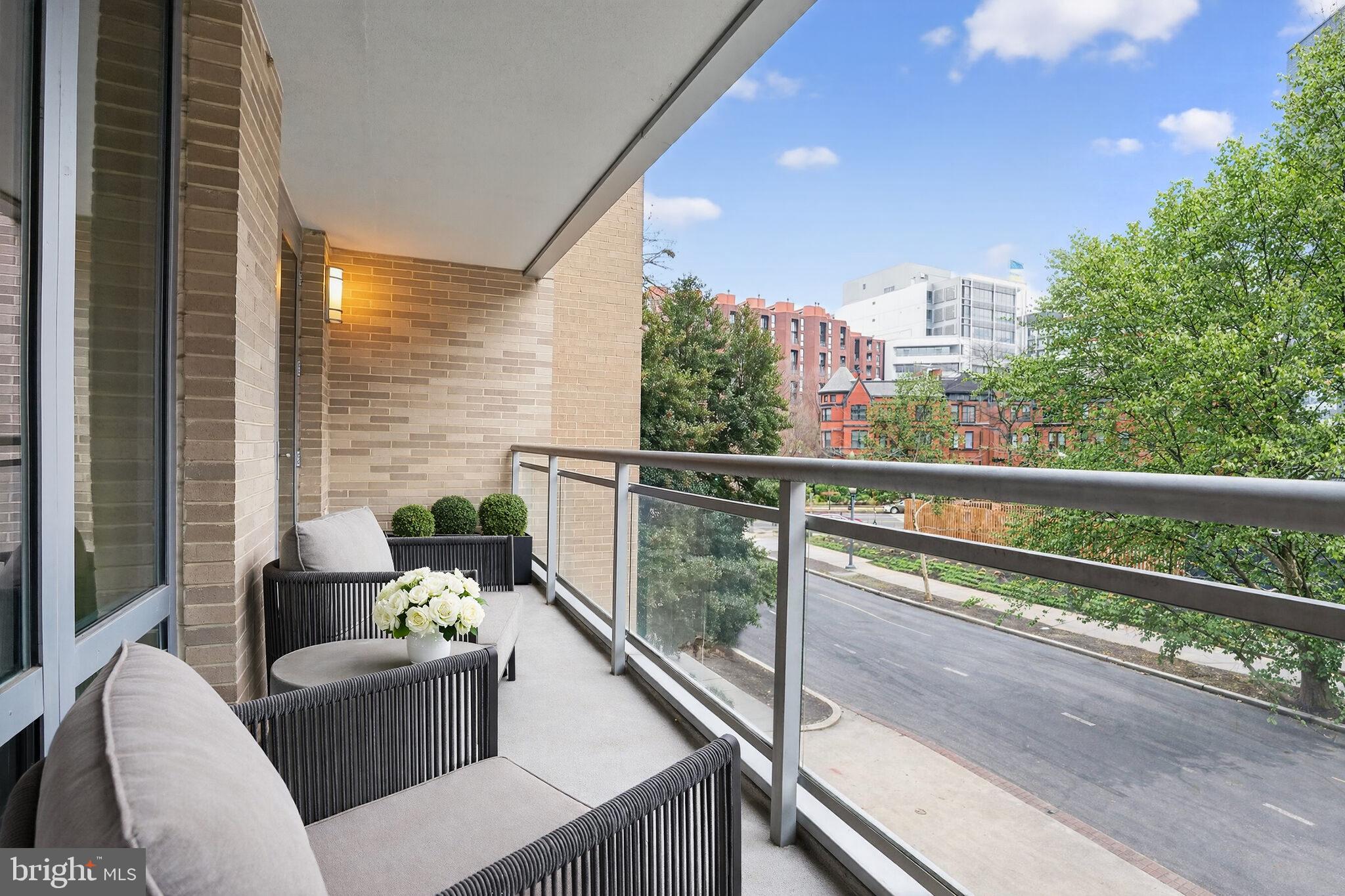 1111 23rd Street Northwest, Unit 2B Washington, DC 20037 - Photo 7 of 22 a view of a balcony with couches