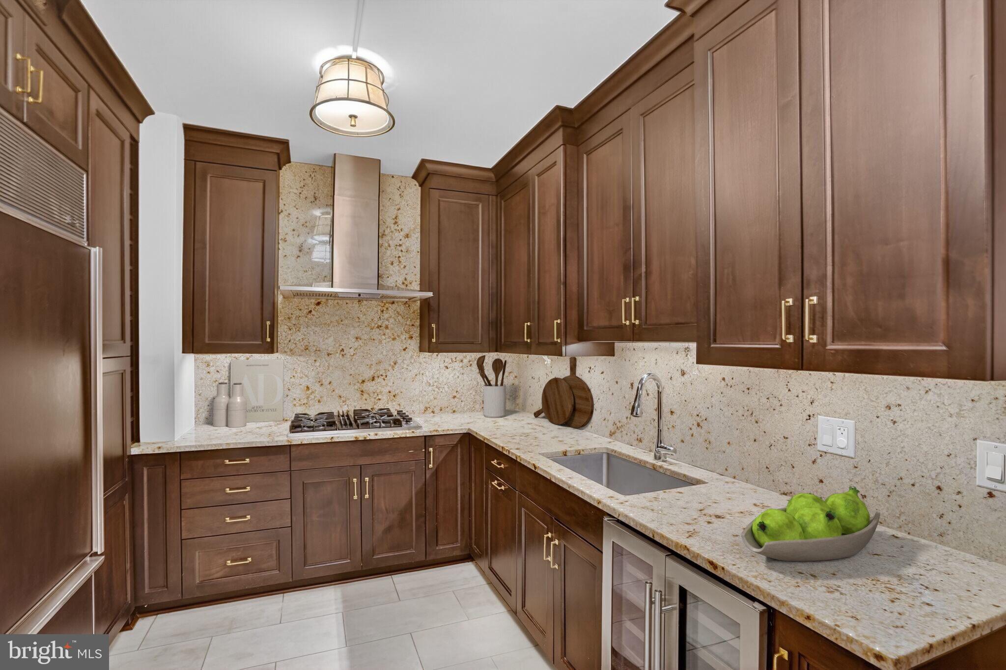 1111 23rd Street Northwest, Unit 2B Washington, DC 20037 - Photo 8 of 22 a kitchen with a sink a stove cabinets and a window