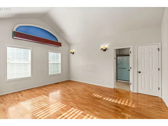 a view of an empty room and window