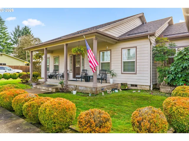 a view of a house with backyard porch and patio
