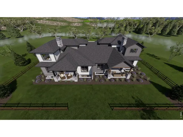 a aerial view of a house with a yard