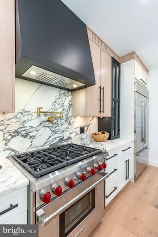 a view of entryway with wooden floor and window