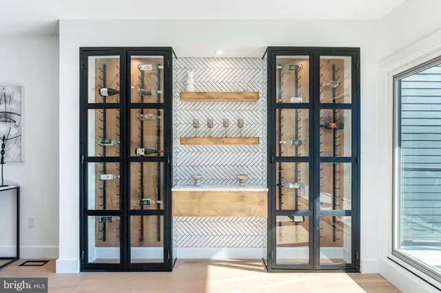 a bathroom with a shower toilet and sink
