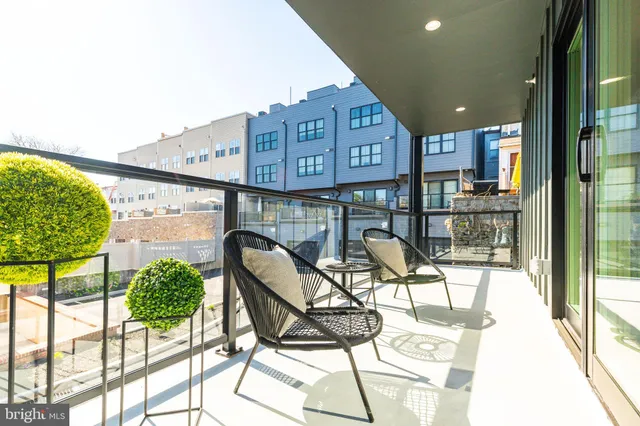 a bedroom with a bed and a mirror