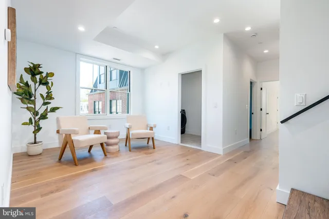 a white bath tub sitting next to a window