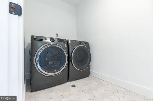 a view of a chairs and tables in the balcony