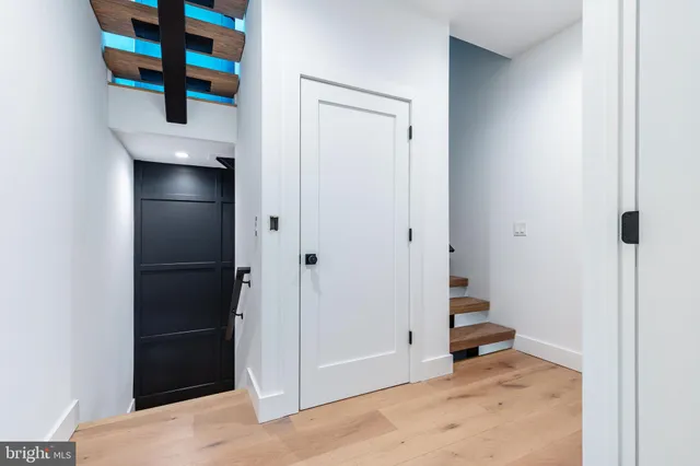 a balcony with wooden benches and wooden floor