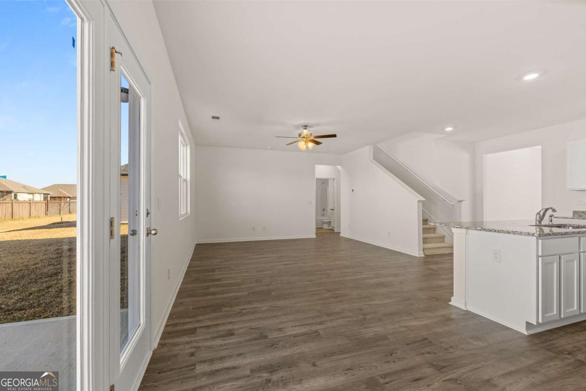 209 Cattle Drive Perry, GA 31069 - Photo 23 of 47 a view of a hallway view with staircase