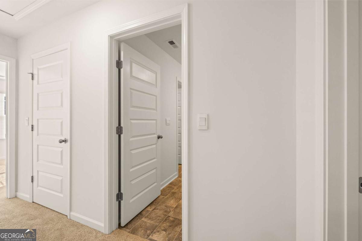209 Cattle Drive Perry, GA 31069 - Photo 39 of 47 a view of a bathroom from the hallway