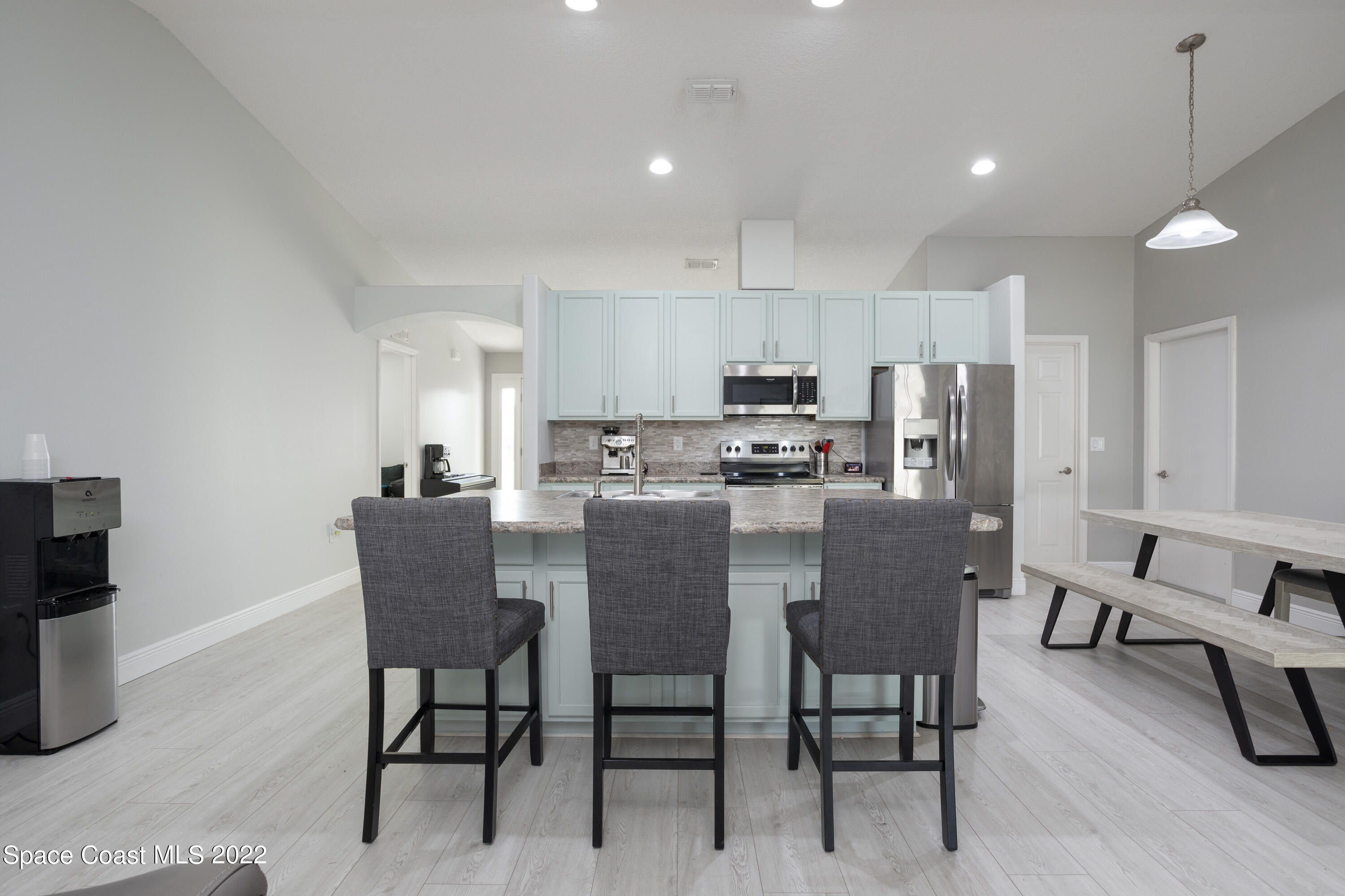 535 Australian Road Northwest Palm Bay, FL 32907 - Photo 11 of 26 kitchen/living
