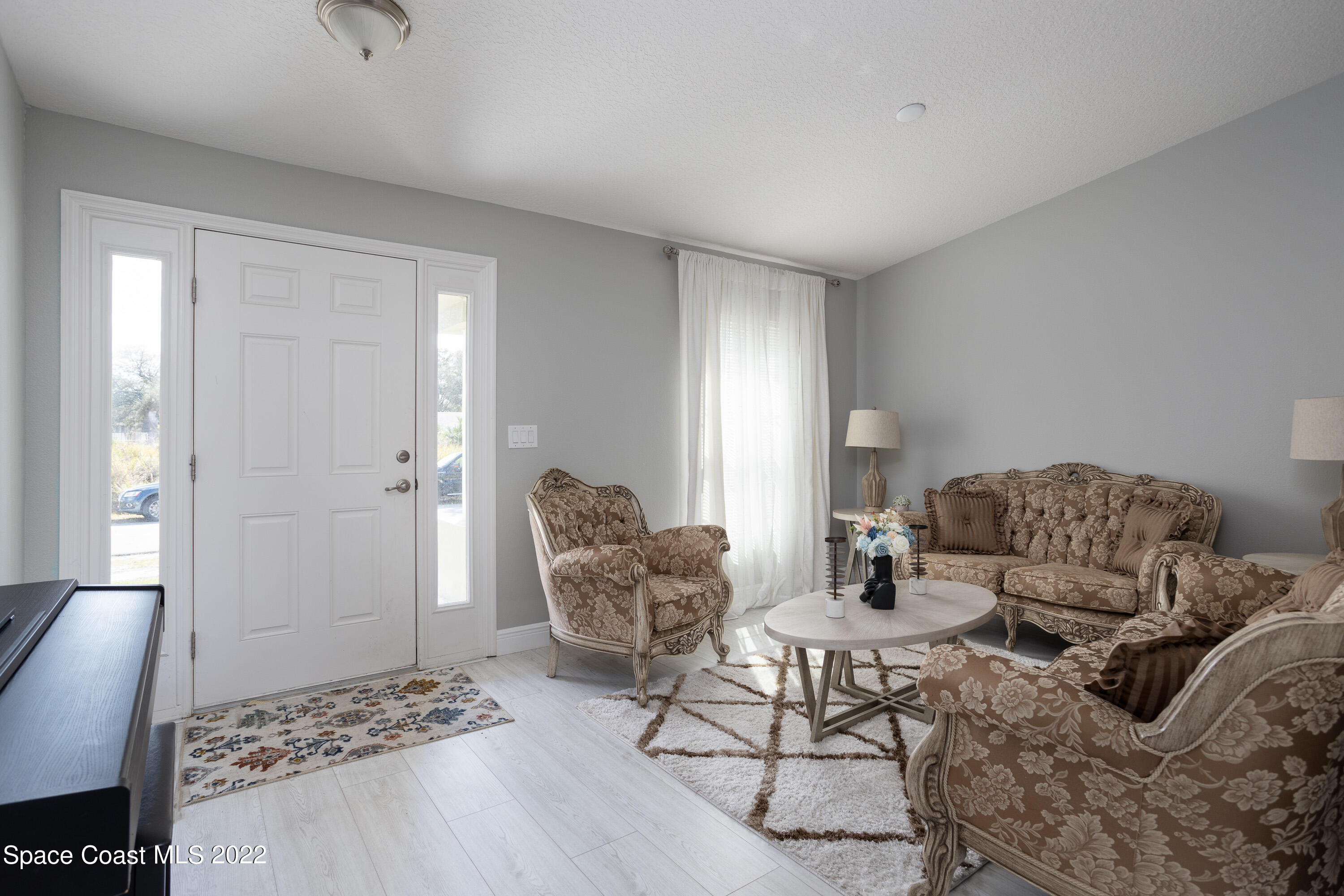 535 Australian Road Northwest Palm Bay, FL 32907 - Photo 3 of 26 Formal living 1