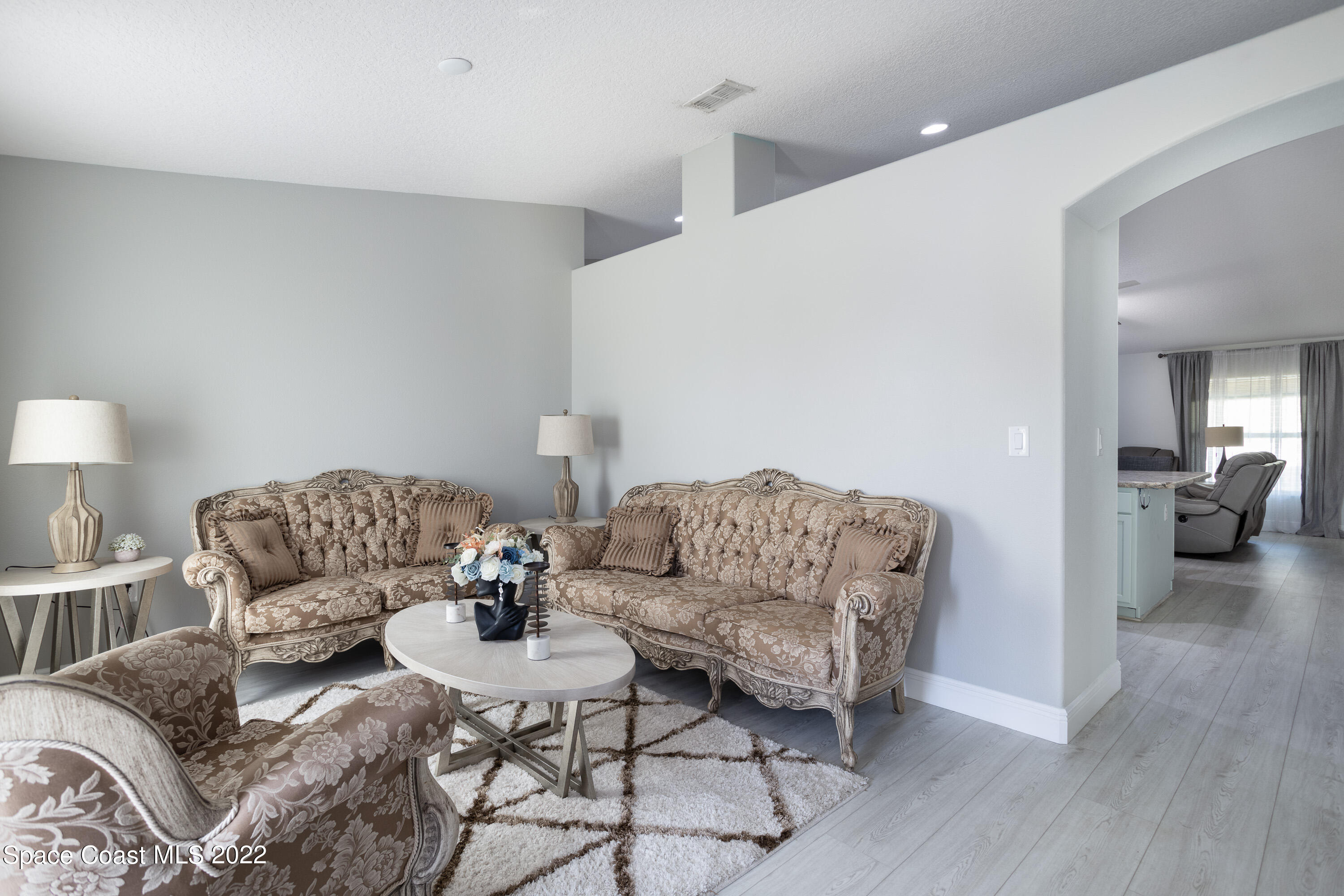 535 Australian Road Northwest Palm Bay, FL 32907 - Photo 4 of 26 Formal living 2