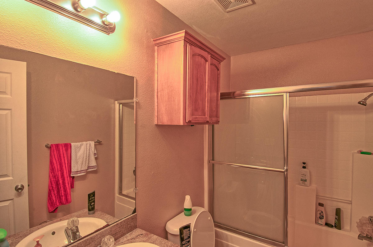 170 Gilmore Road Red Bluff, CA 96080 - Photo 13 of 33 a bathroom with a shower curtain and a sink