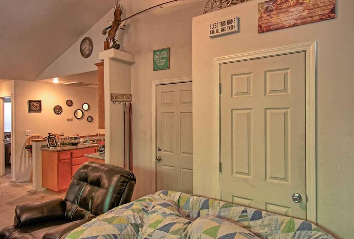 170 Gilmore Road Red Bluff, CA 96080 - Photo 29 of 33 a bedroom with furniture and a wooden floor